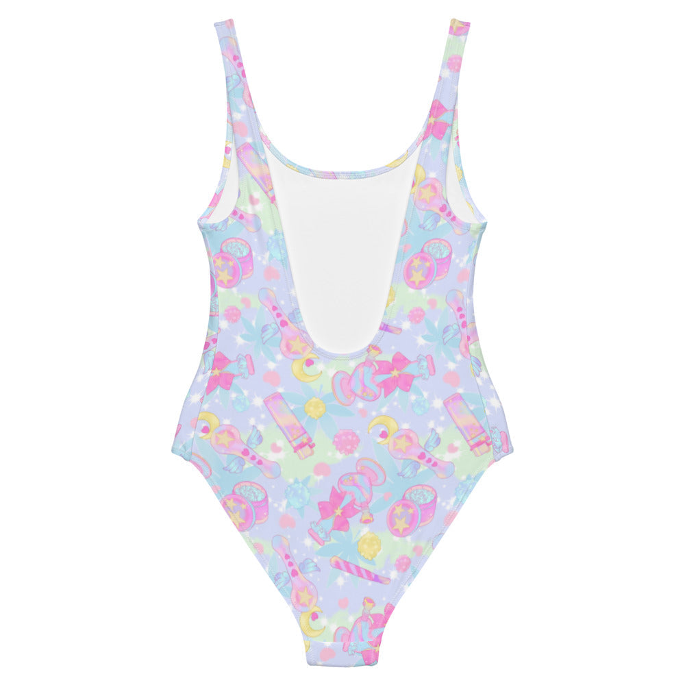Indica Magica One-Piece Swimsuit features a colorful kawaii design, perfect for showcasing your unique style.