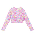 Stylish Indica Magica Long-sleeved Crop Top in playful print, perfect for athleisure and eco-friendly fashion.