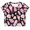 Pretty pastel pink Strawberry Crop Top featuring a kawaii aesthetic, perfect for everyday wear and styled comfort.
