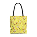 Brighten your day with the Lemon Tote Bag (Yellow), featuring a delicious lemon pattern and durable cotton straps.