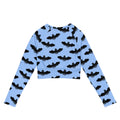 Stylish Lilith Long-sleeved Crop Top featuring a unique bat print, perfect for eco-friendly athleisure and sportswear.