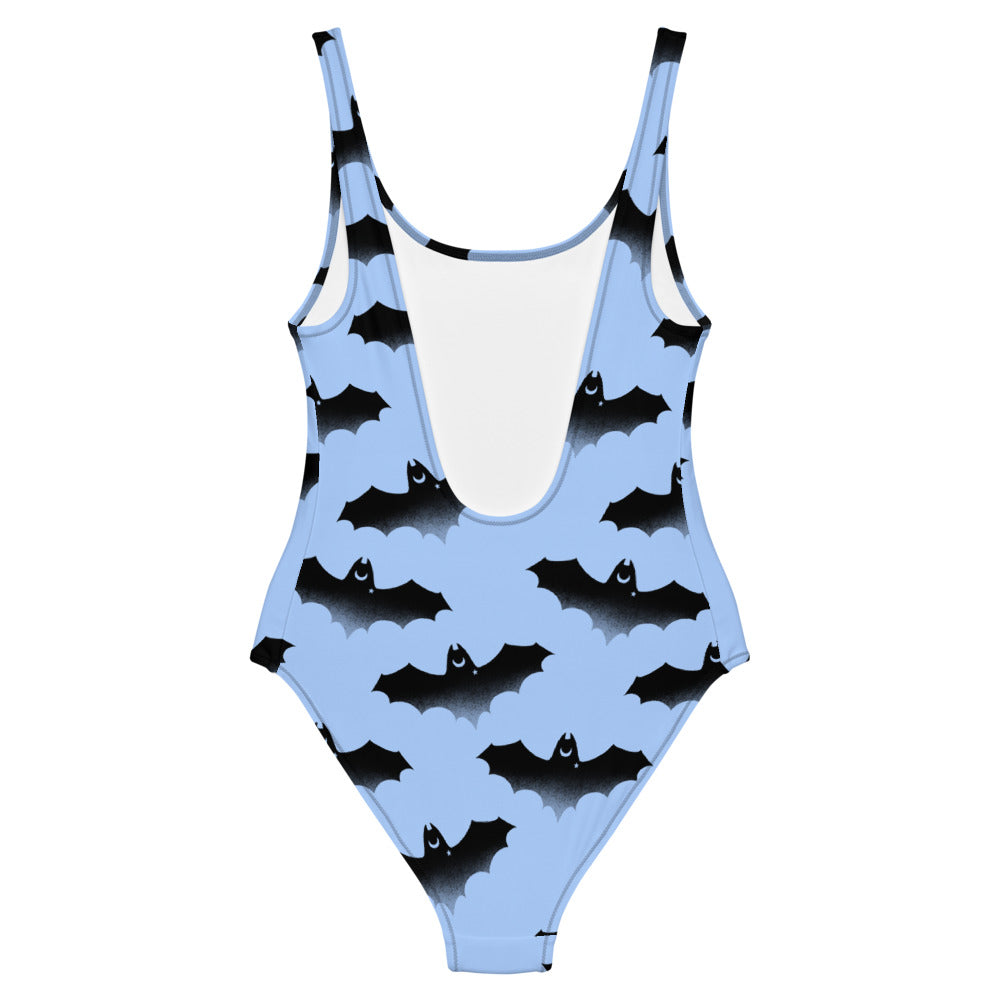 Stylish Lilith One-Piece Swimsuit with bat design, perfect for showcasing your figure at the beach or pool.