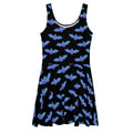 Stylish Lilith Skater Dress featuring a bat pattern, perfect for sunny days and playful outings.