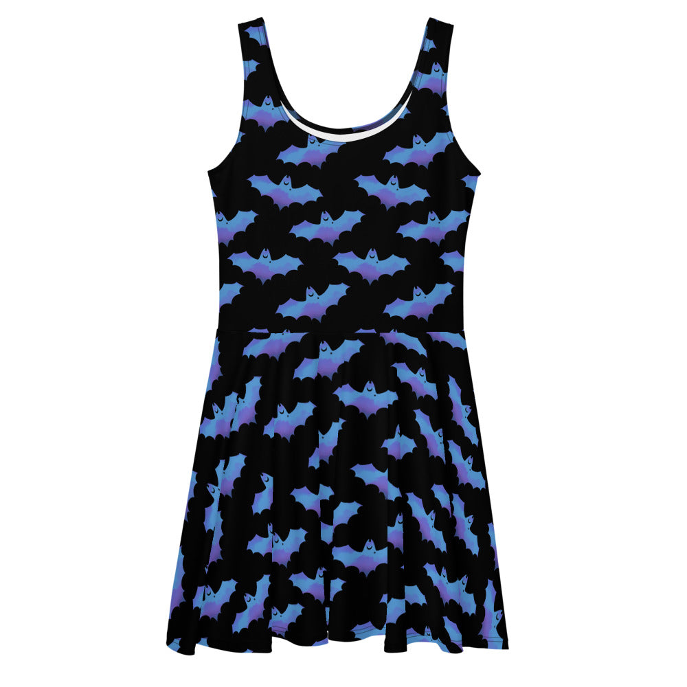 Stylish Lilith Skater Dress featuring a bat pattern, perfect for sunny days and playful outings.