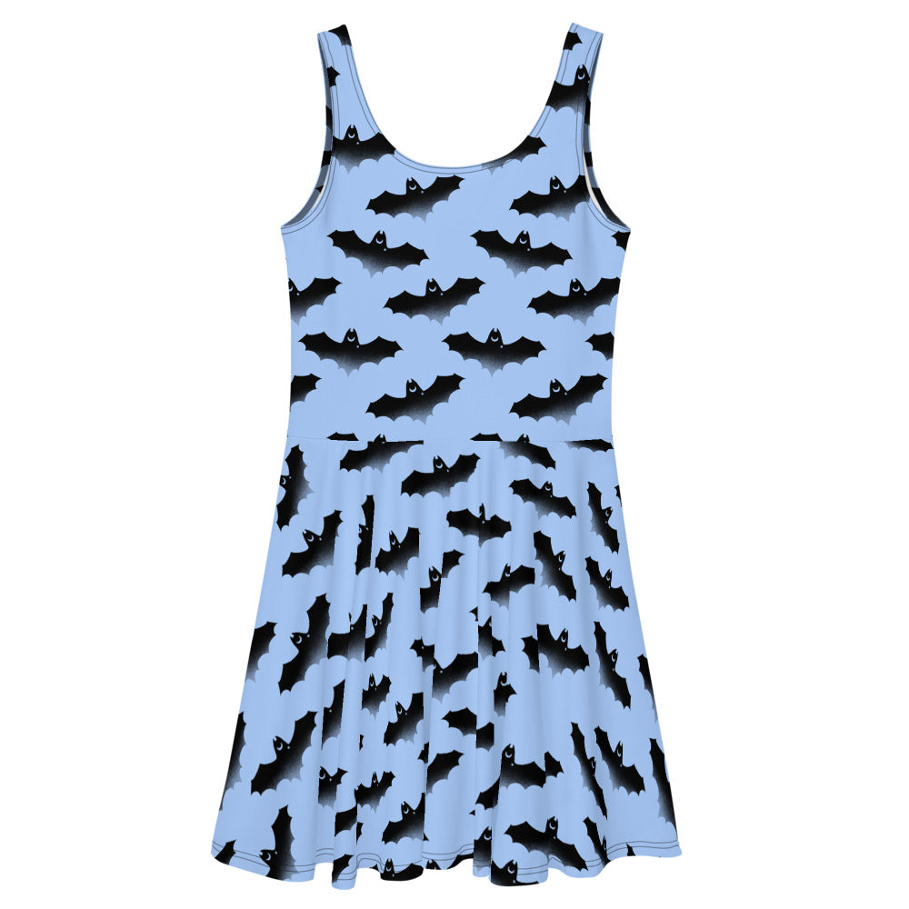 Adorable Lilith Skater Dress featuring a playful bat print, perfect for sunny outings and stylish summer fun.
