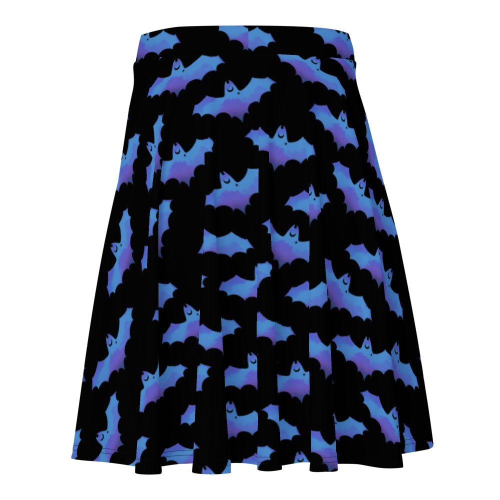 Stylish Lilith Skater Skirt featuring a vibrant bat print, perfect for warm weather outings.