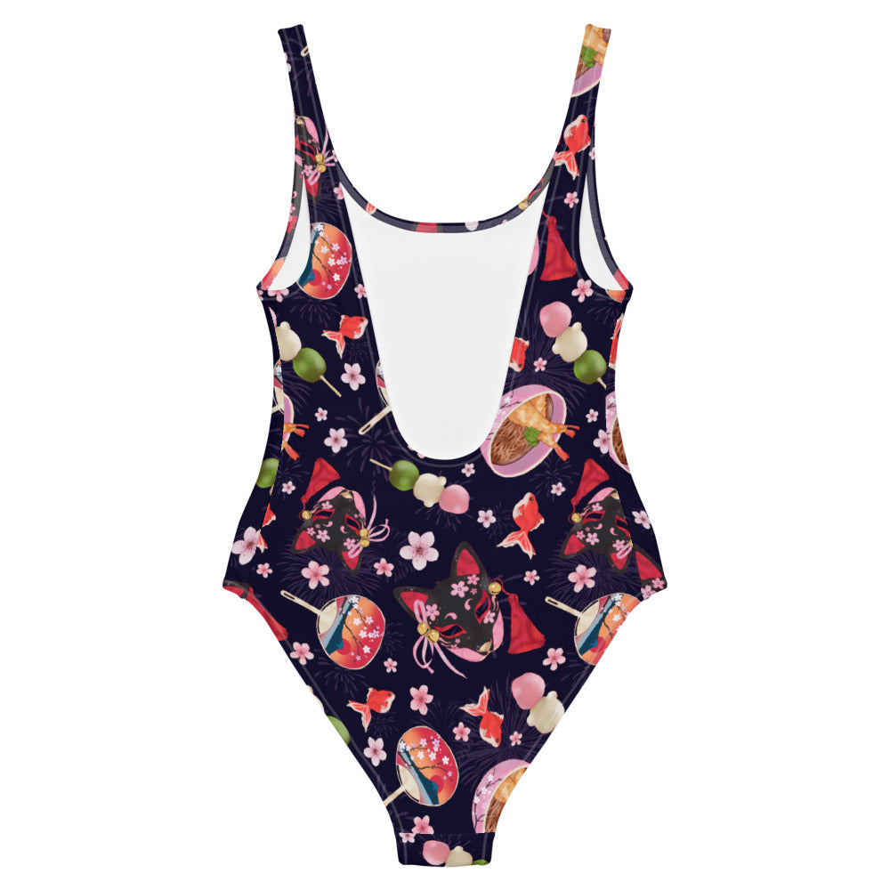 Matsuri One-Piece Swimsuit features vibrant patterns, perfect for making a splash at the beach or pool.