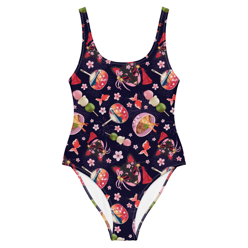 Matsuri One-Piece Swimsuit featuring vibrant patterns, perfect for making a splash at the beach or pool.
