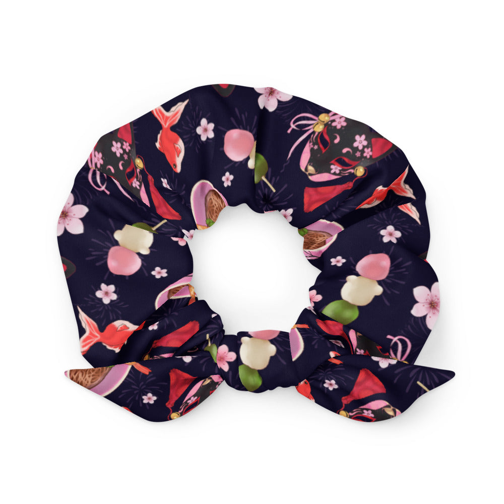Matsuri Scrunchie features a vibrant design, perfect for adding flair to any outfit. Shop now for this trendy accessory!