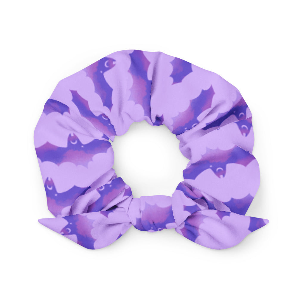 Morrigan Scrunchie features a trendy bat design, perfect for gym or night out styling. Ideal for any outfit.