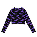 Morrigan Long-sleeved Crop Top features a stylish bat pattern, perfect for eco-friendly athleisure and sportswear.