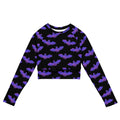 Morrigan Long-sleeved Crop Top features a stylish bat print, perfect for eco-friendly athleisure and sportswear.