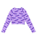 Stylish Morrigan Long-sleeved Crop Top in purple bat print, perfect for eco-friendly athleisure and sportswear.