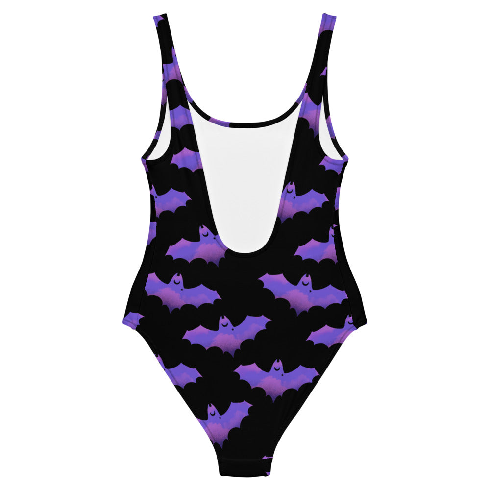 Morrigan One-Piece Swimsuit features a stylish bat pattern, perfect for beach days or pool parties. Embrace your dark side!
