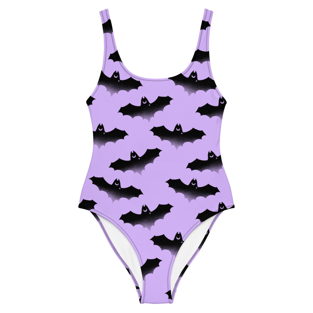 Flatter your figure in the Morrigan One-Piece Swimsuit, featuring a fun bat print for stylish beach days.