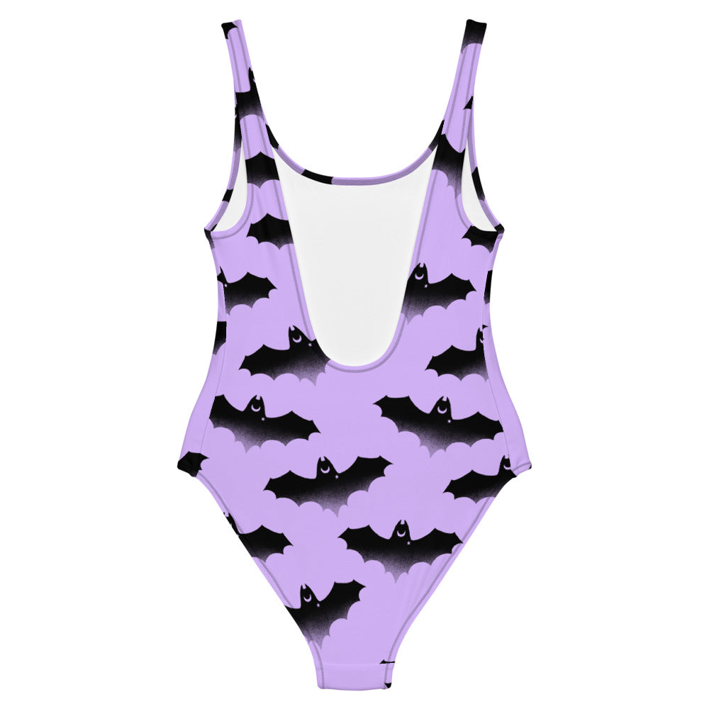 Morrigan One-Piece Swimsuit features a playful bat design, perfect for showcasing your unique style by [STORE NAME].