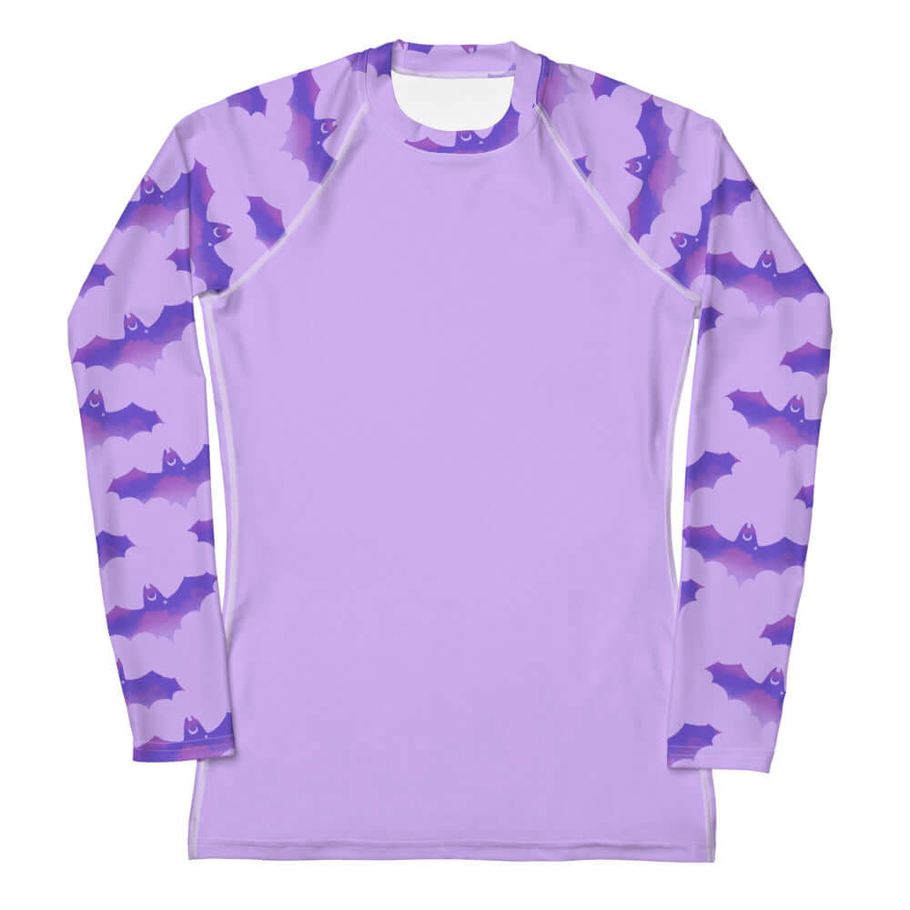 Morrigan Rash Guard features a stylish design for active wear, offering sun protection and comfort during sports.