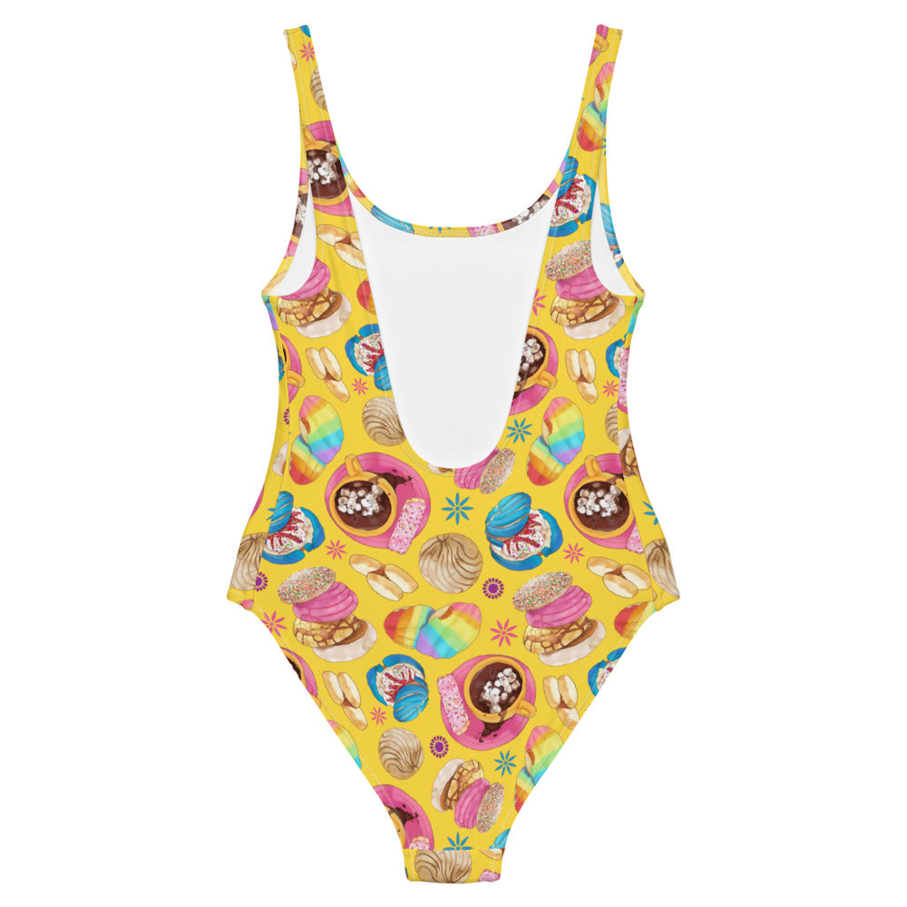 Bright and colorful Pan Dulce One-Piece Swimsuit, perfect for making a splash at the pool or beach.