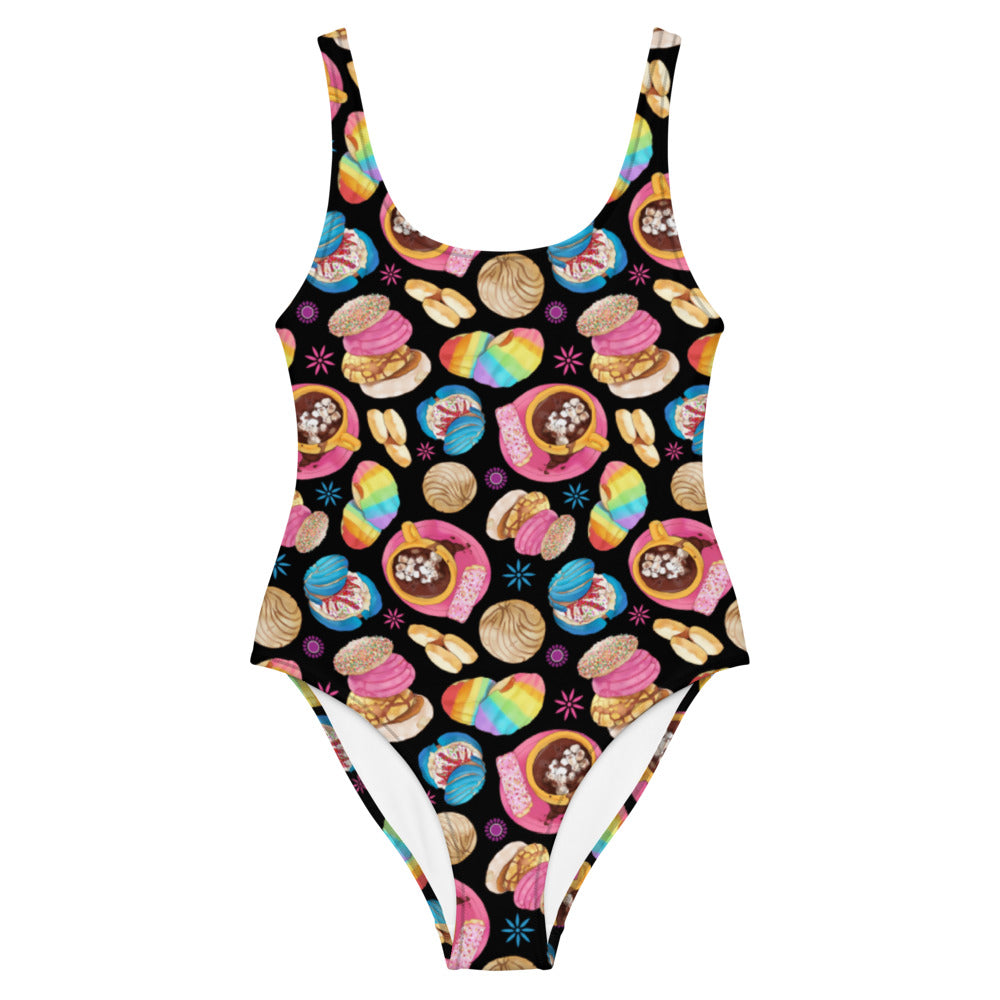 Colorful Pan Dulce One-Piece Swimsuit featuring sweet treats, perfect for pool days and flattering for all figures.