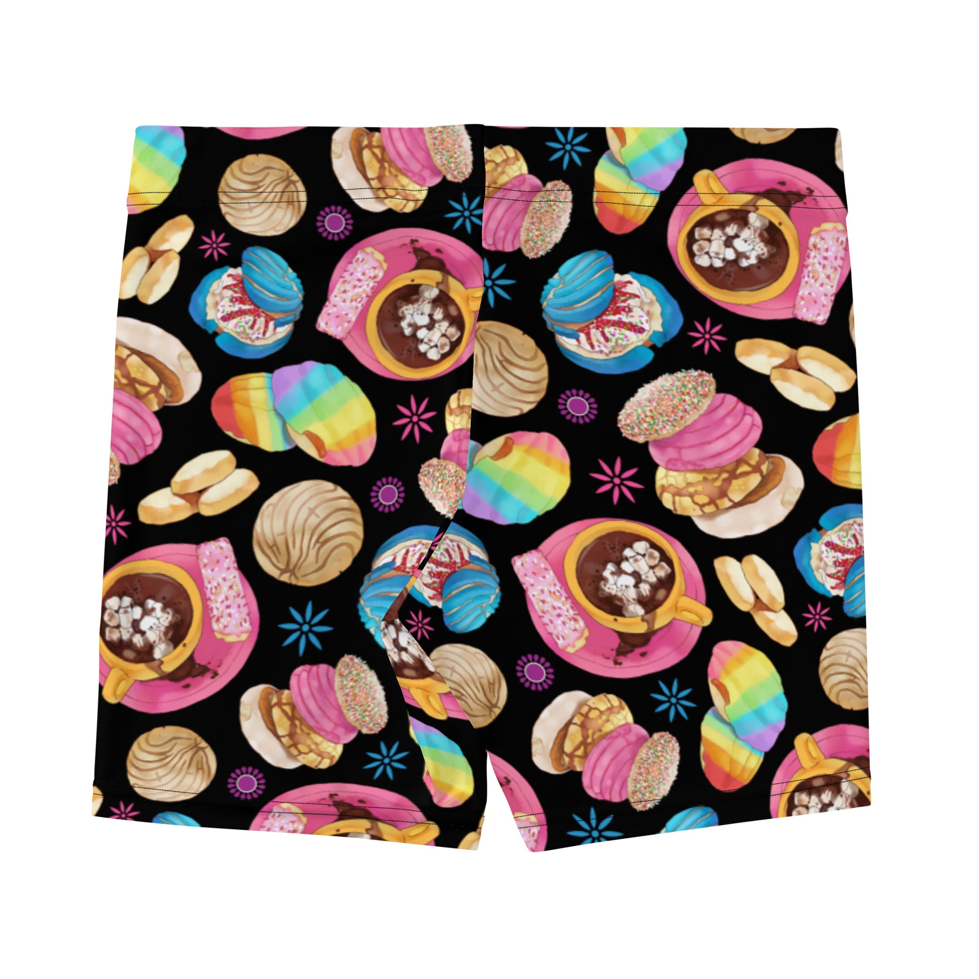 Comfortable and stylish Pan Dulce Shorts, featuring a vibrant dessert print, perfect for sunny day outings.