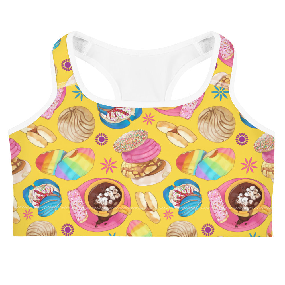 Colorful Pan Dulce Sports bra featuring sweet treats, perfect for a stylish workout look. Stay dry and chic!