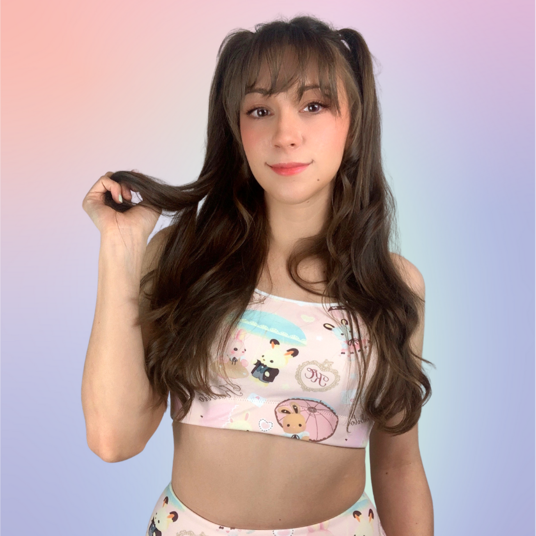 Cute model showcasing the Parasol Bunny Sports bra, perfect for workouts with its soft, moisture-wicking fabric.