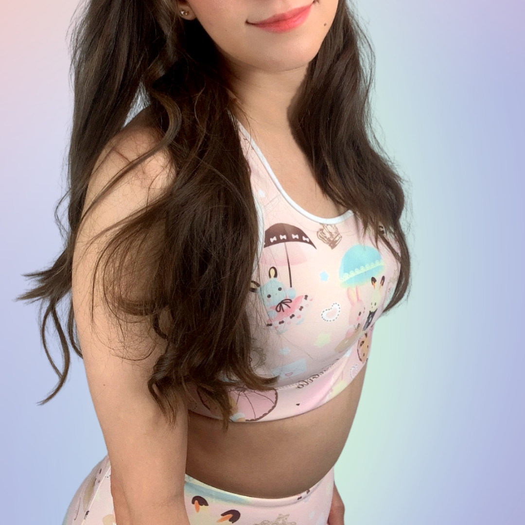 Stylish Parasol Bunny Sports bra featuring cute bunnies, perfect for workouts and staying cool at the gym.