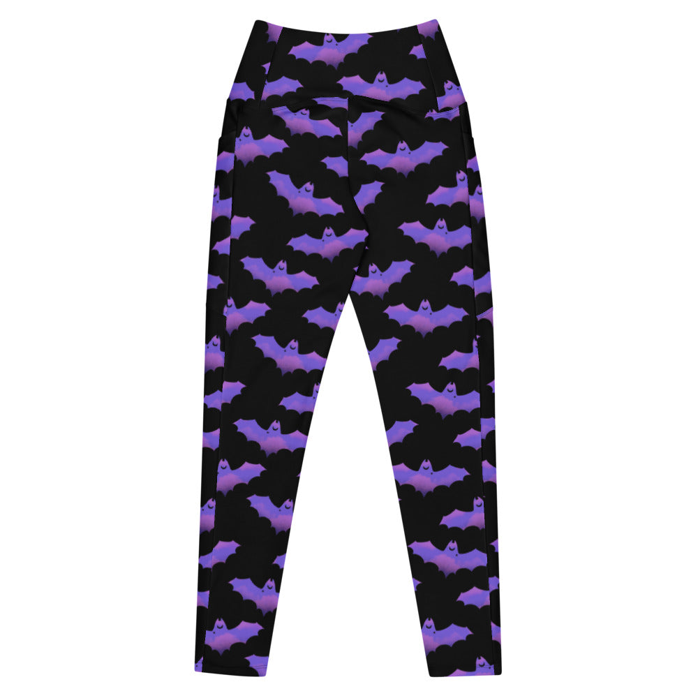 Premium Morrigan Leggings with bat print, high-waisted design, and pockets for comfort in workouts.