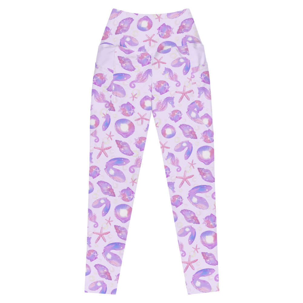 Elevate your style with Premium Sea Princess Leggings, featuring a whimsical seashell design and practical pockets.