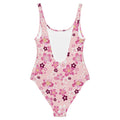 Sakura One-Piece Swimsuit features vibrant pink blossoms, perfect for flaunting your style at the beach or pool.