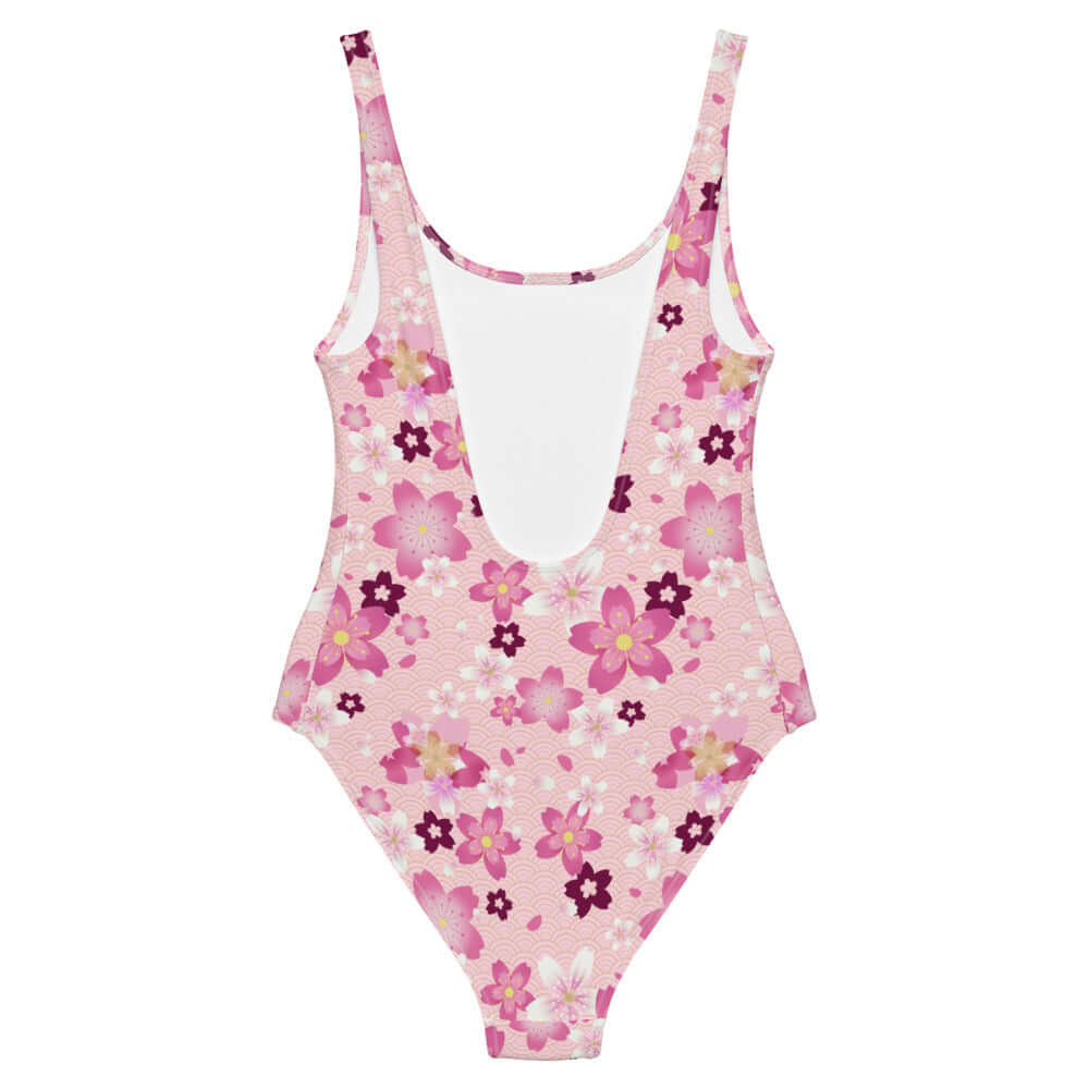 Sakura One-Piece Swimsuit features vibrant pink blossoms, perfect for flaunting your style at the beach or pool.