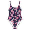 Sakura One-Piece Swimsuit featuring vibrant pink blossoms on a navy background, perfect for beach or pool days.