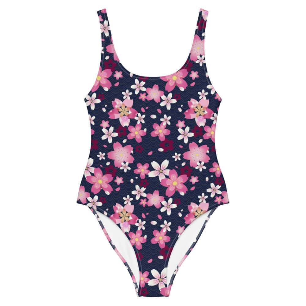 Sakura One-Piece Swimsuit featuring vibrant pink blossoms on a navy background, perfect for beach or pool days.