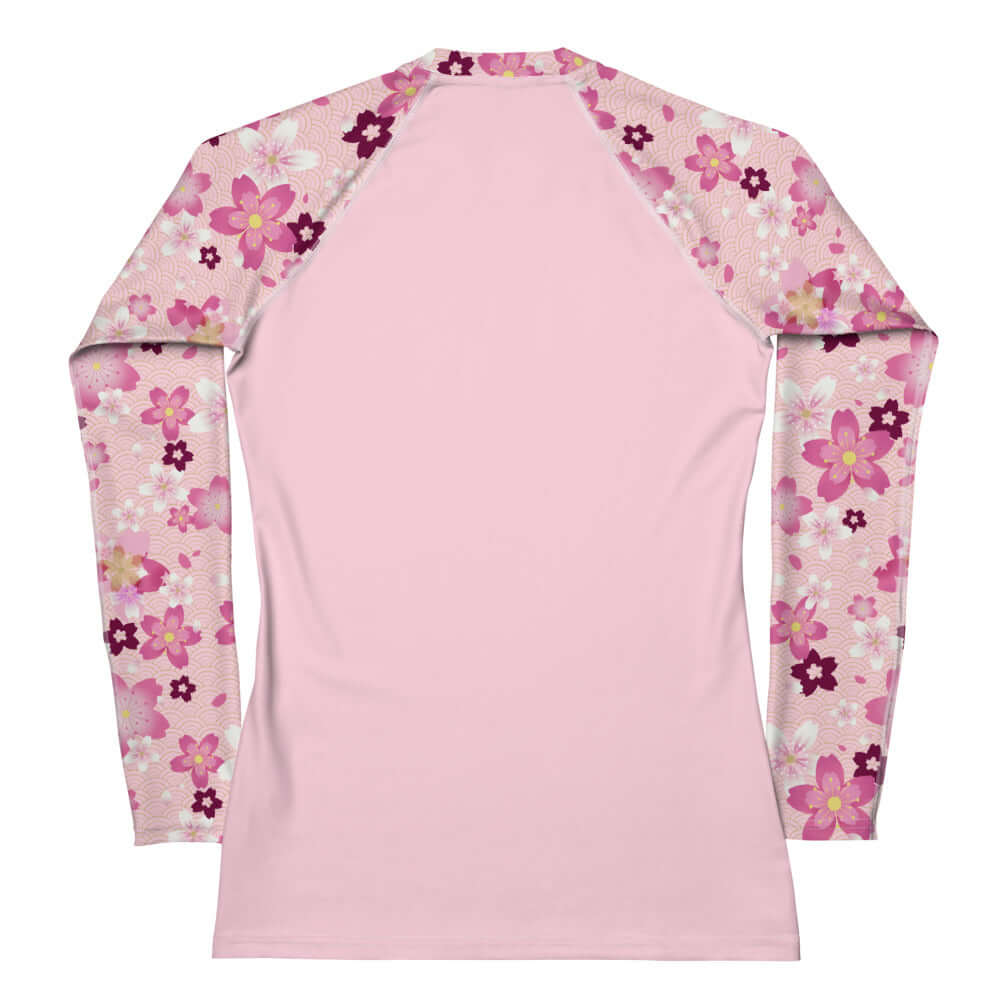 Stylish Sakura Rash Guard with floral design, perfect for active wear and sun protection at your favorite sports.