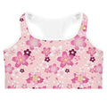 Sakura Sports bra features a whimsical floral design, perfect for stylish workouts while staying dry and comfy.