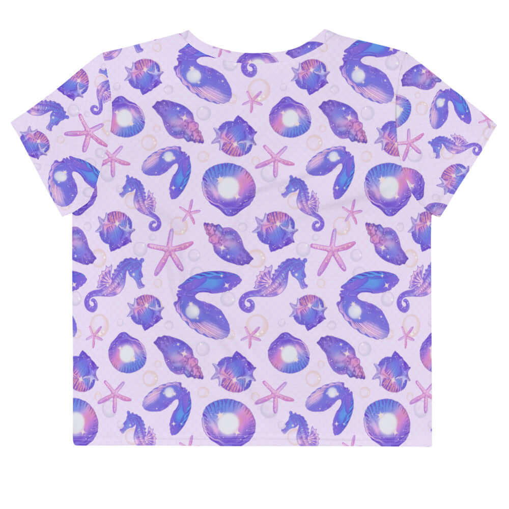 Embrace summer style with the Sea Princess Crop Top, featuring a vibrant sea-themed print perfect for any occasion.