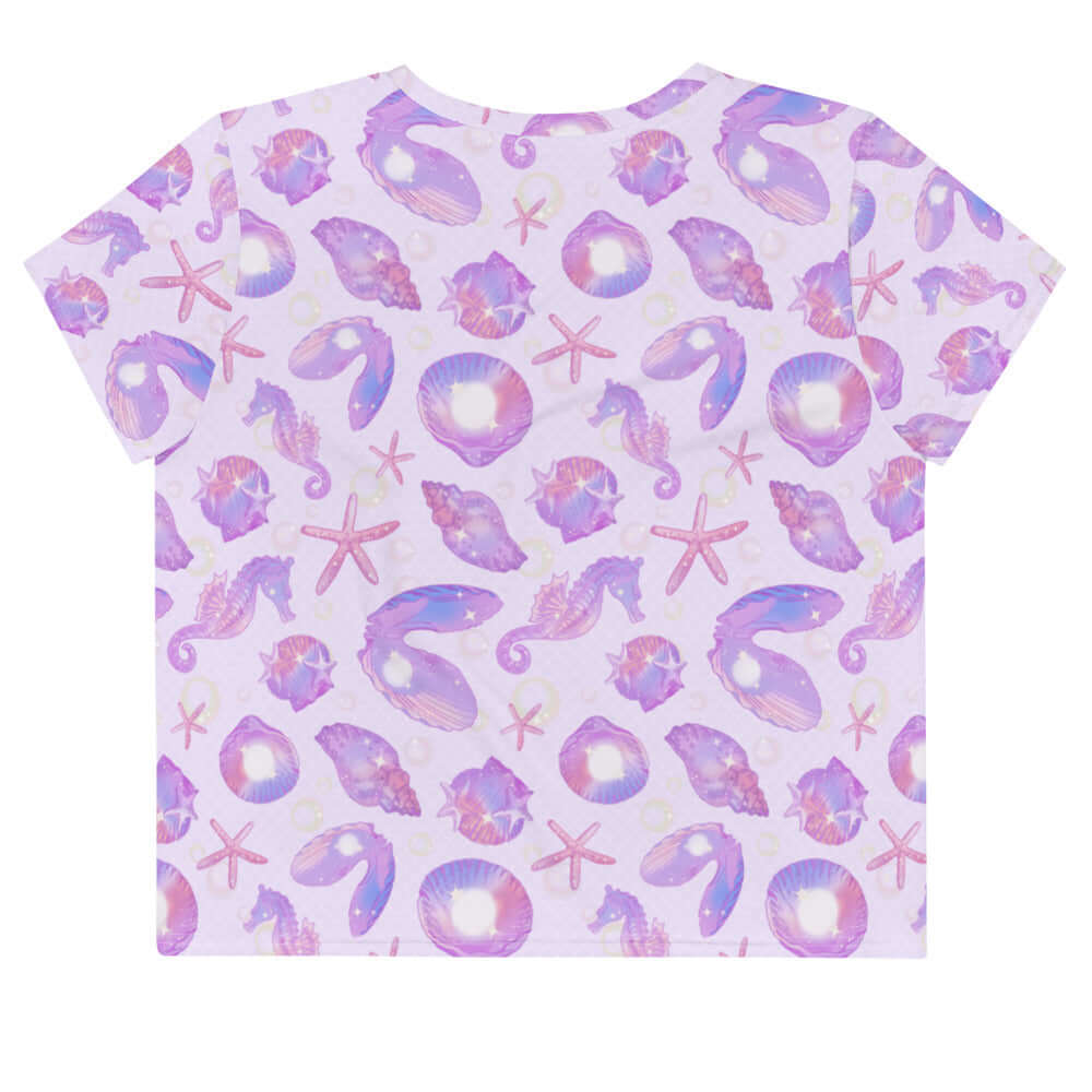 Bright and playful, the Sea Princess Crop Top features a vibrant seashell print, perfect for summer outings.