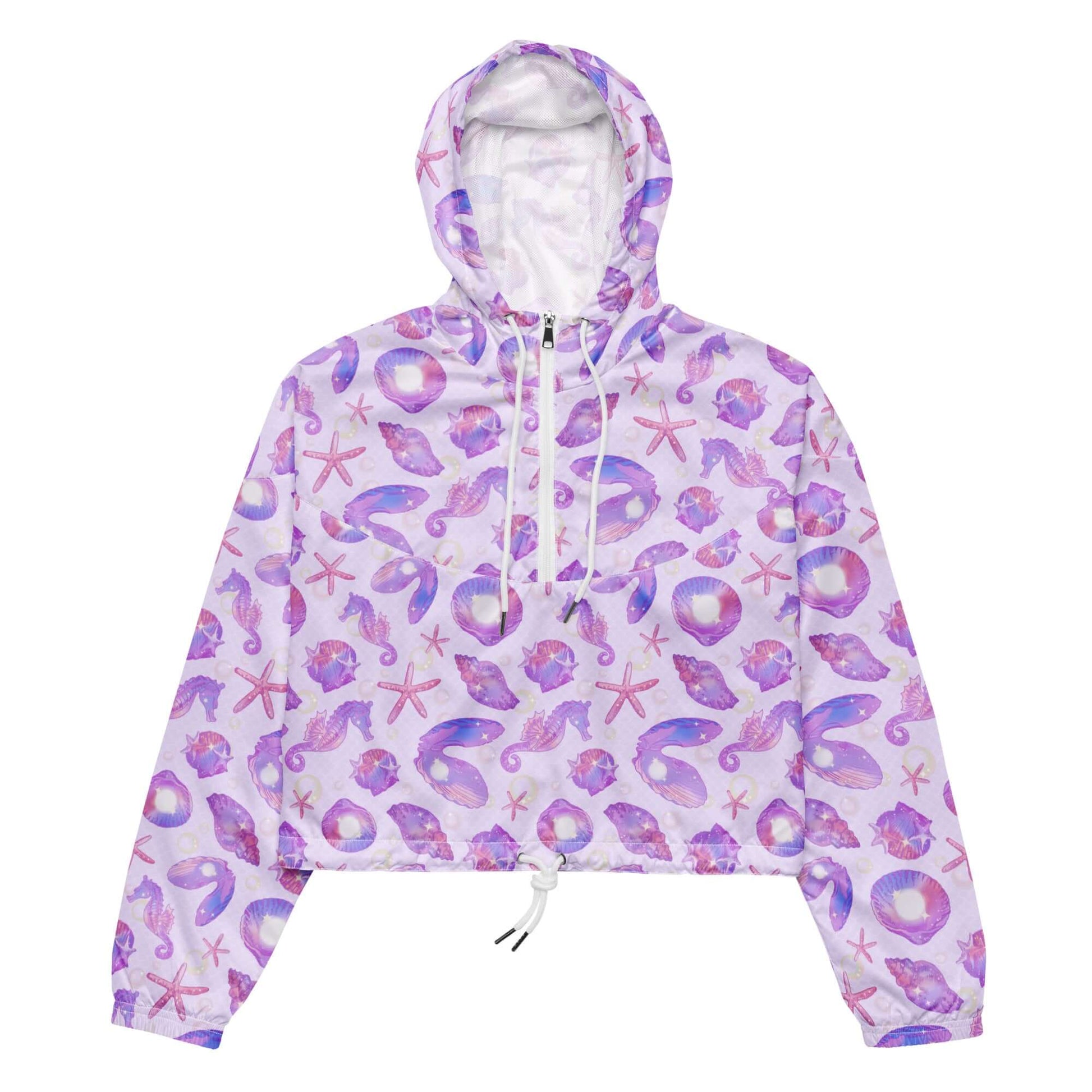Lightweight and stylish, the Sea Princess cropped windbreaker features a vibrant seashell design perfect for adventures.