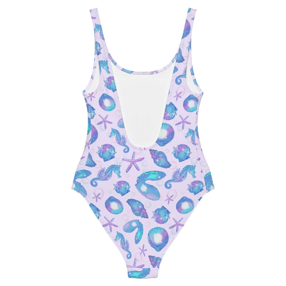 Sea Princess One-Piece Swimsuit features vibrant seashells and stars, perfect for a mermaid-inspired beach day.