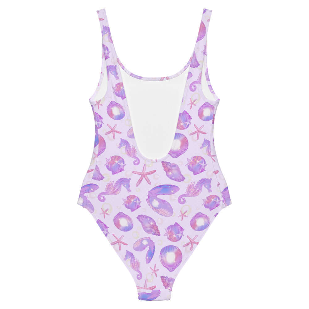 Sea Princess One-Piece Swimsuit features a whimsical seashell design, perfect for feeling like a mermaid at the beach.