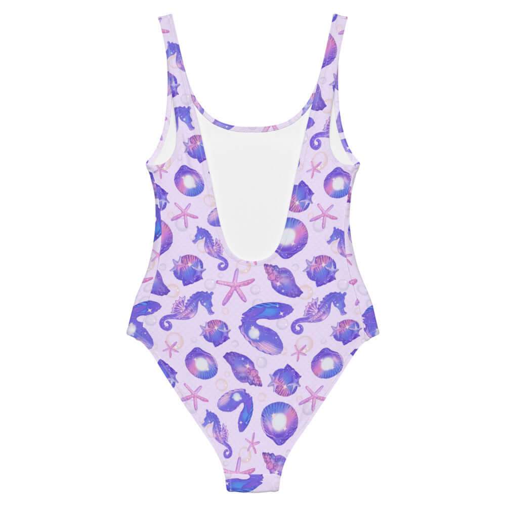 Stylish Sea Princess One-Piece Swimsuit adorned with seashells, stars, and sparkles for a mermaid-inspired look.