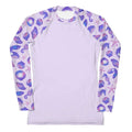 Stylish Sea Princess Rash Guard features vibrant shell prints, perfect for sun protection during active sports.