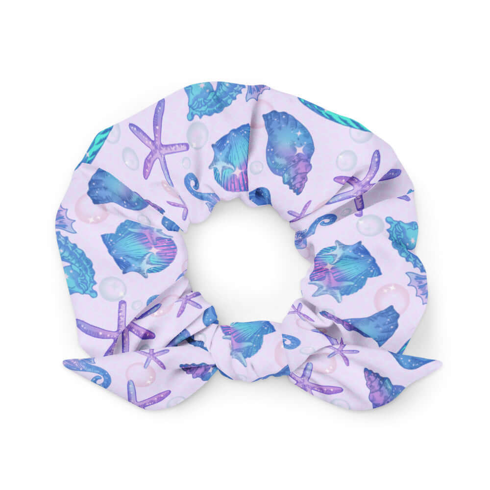 Stylish Sea Princess Scrunchie featuring vibrant seashell patterns, perfect for elevating your summer outfits.