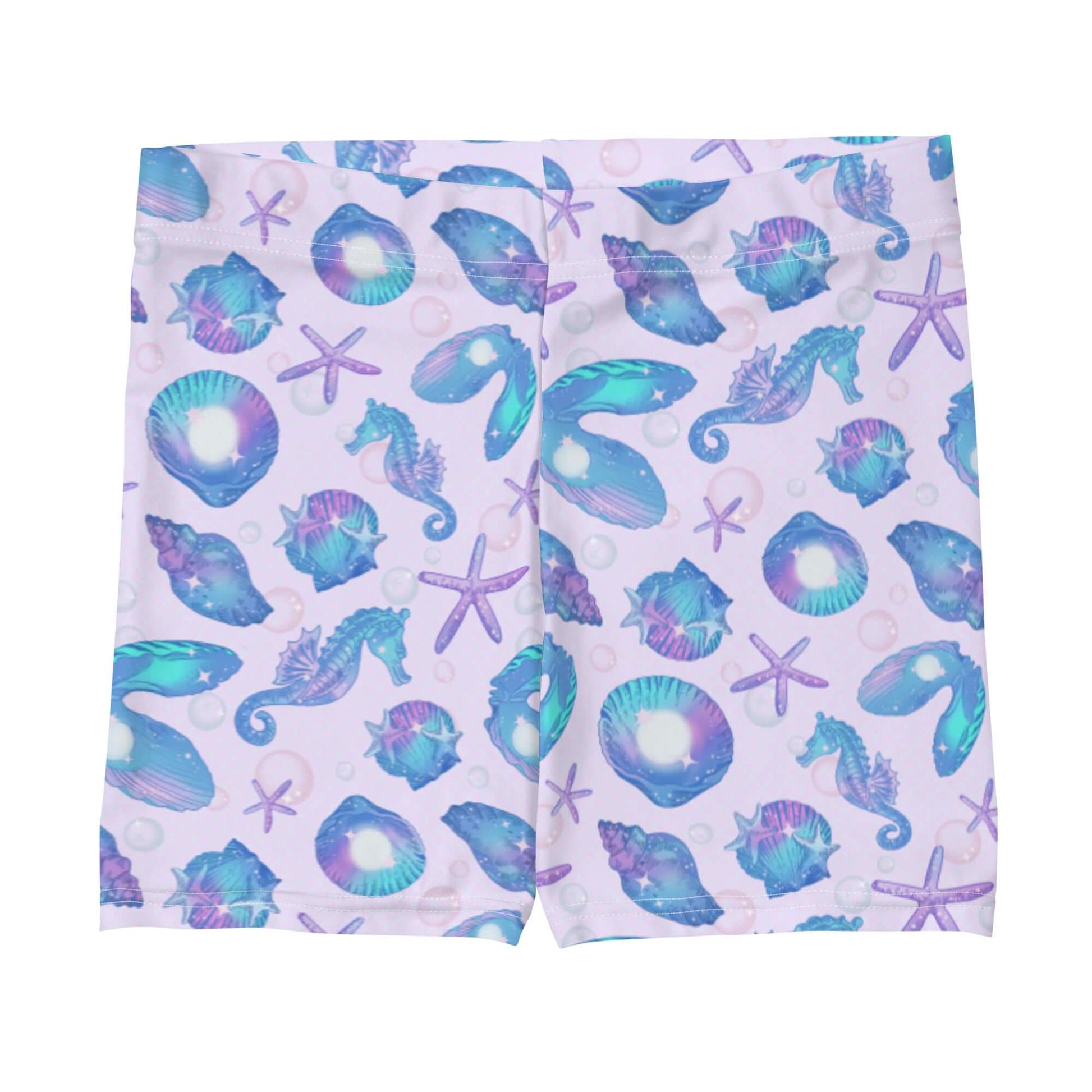 Stylish Sea Princess Shorts featuring a vibrant seashell pattern, perfect for summer beach outings and workouts.