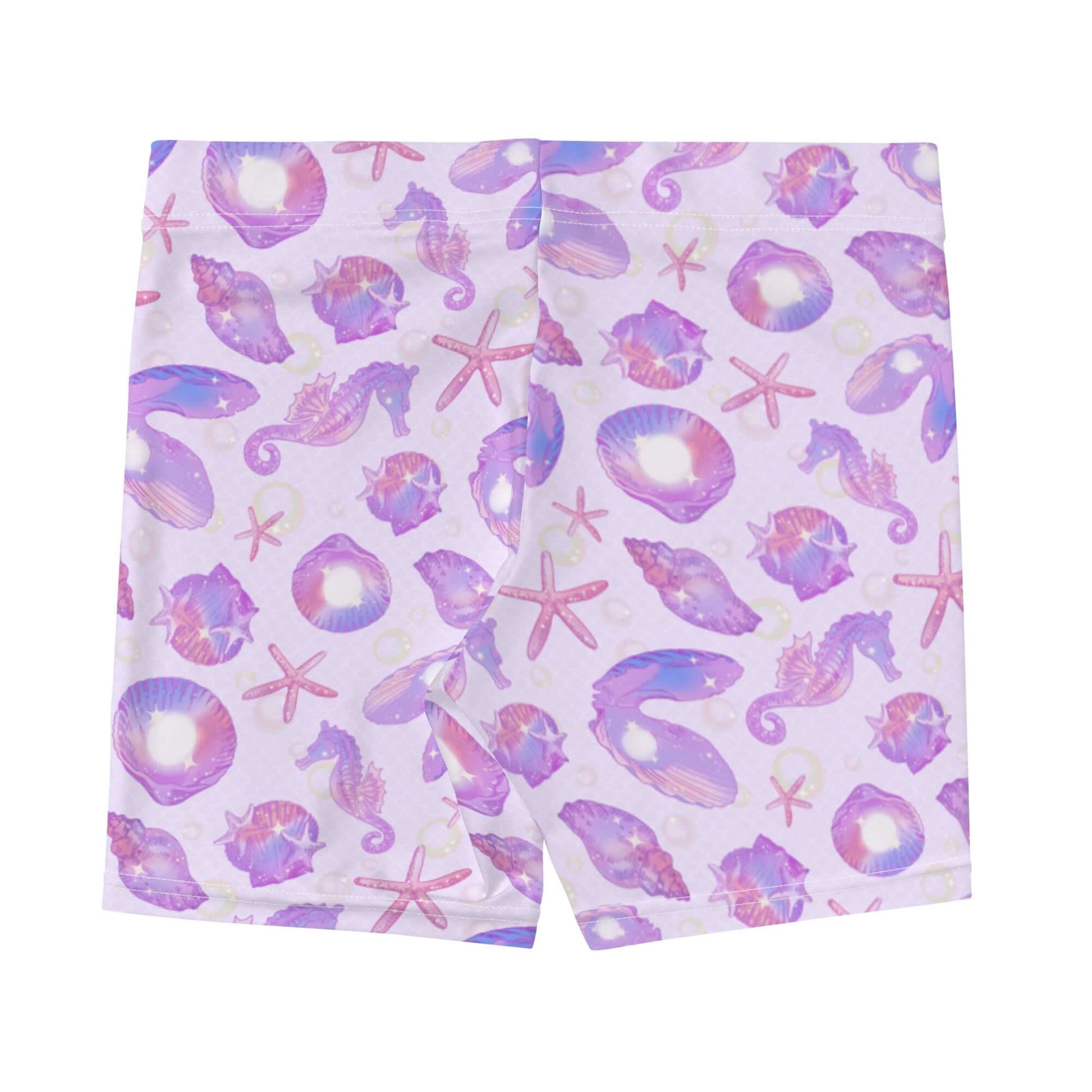 Colorful Sea Princess Shorts featuring seashells and seahorses, perfect for beach runs and summer style.