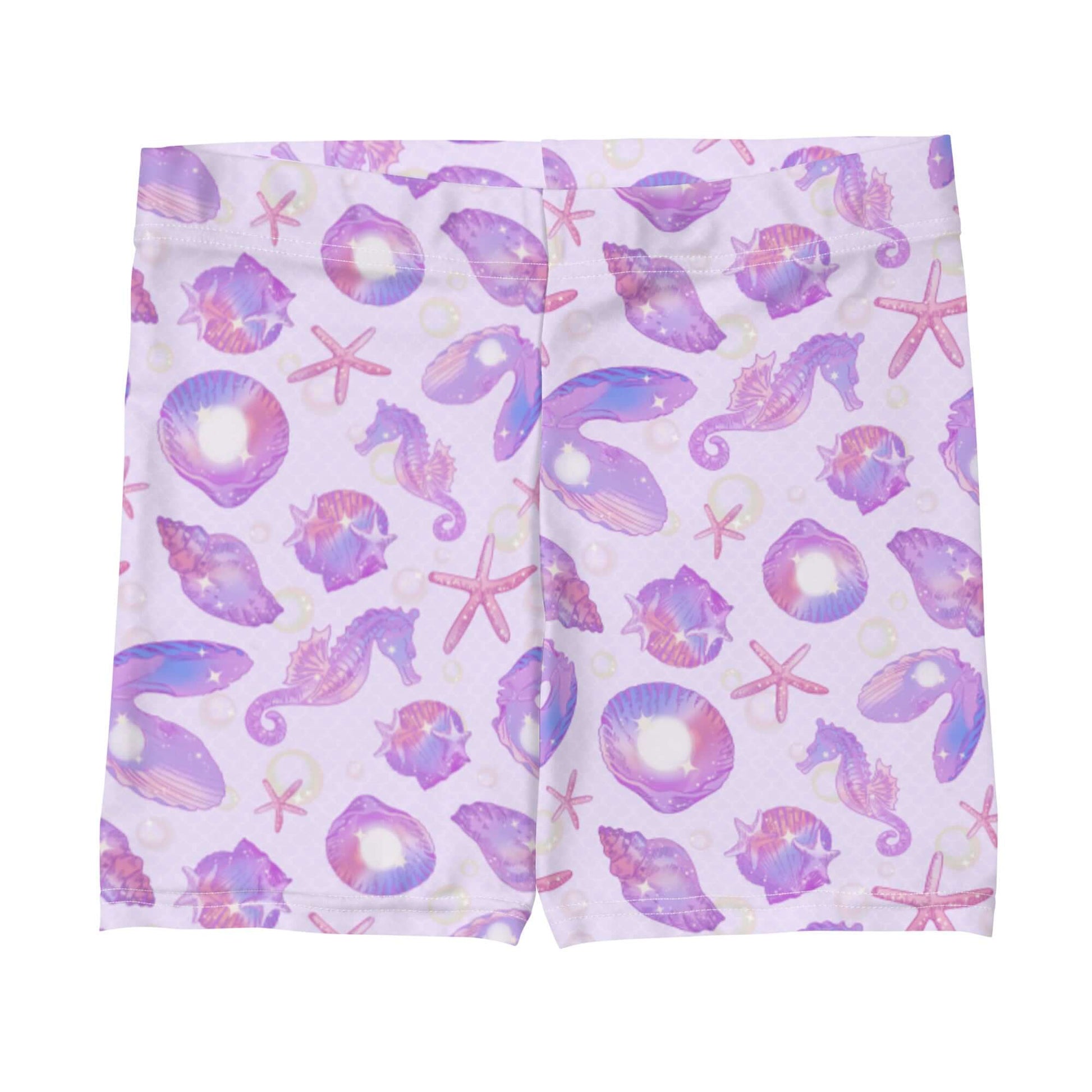 Vibrant Sea Princess Shorts featuring seashells, perfect for summer adventures and beach runs.