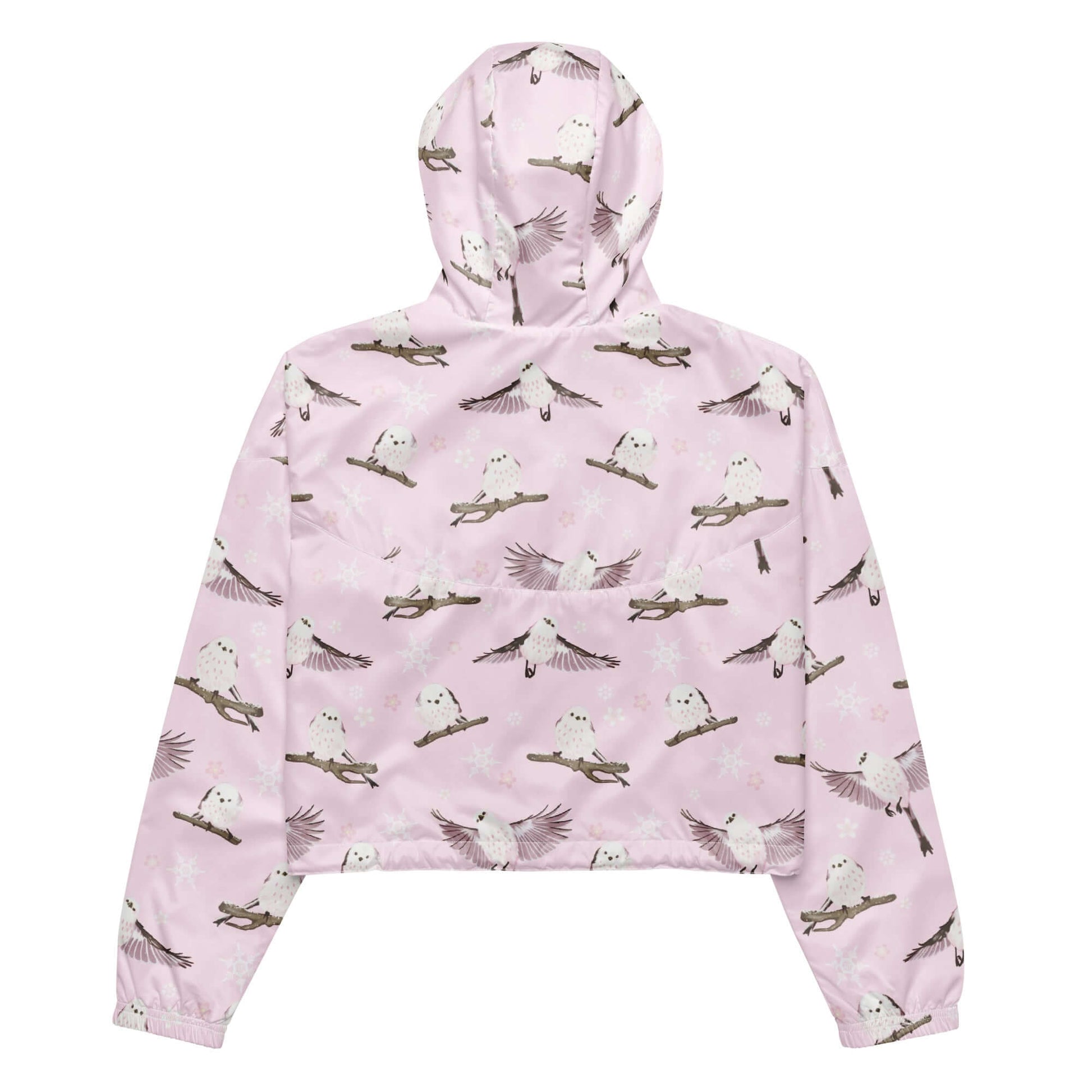 Lightweight and stylish, the Snow Bird cropped windbreaker features a fun bird print, perfect for any adventure.