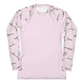 Discover the Snow Bird Rash Guard, a stylish long-sleeve top designed for sun and wind protection during sports.