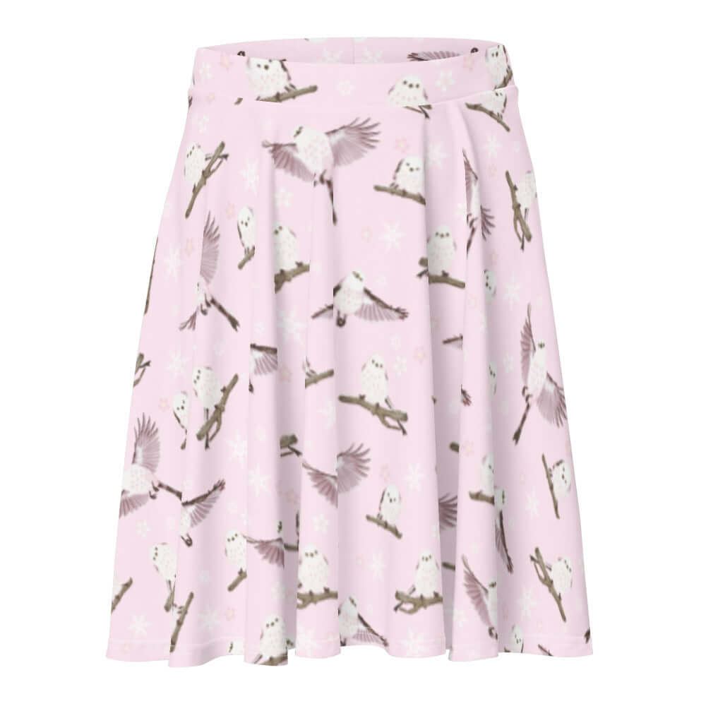 Snow Bird Skater Skirt features a playful pastel design with snowy birds, perfect for winter fashion.
