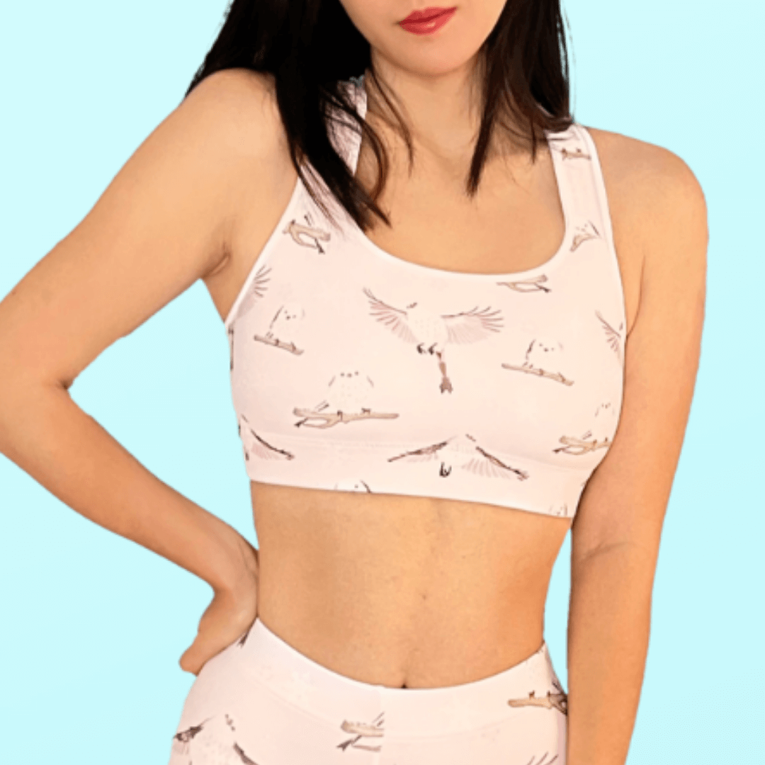 Stylish Snow Bird Sports bra featuring a cute bird print, perfect for workouts and staying adorable.